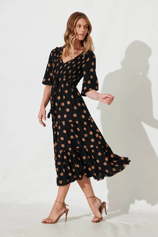 linda-midi-dress-in-black-with-brown-spot