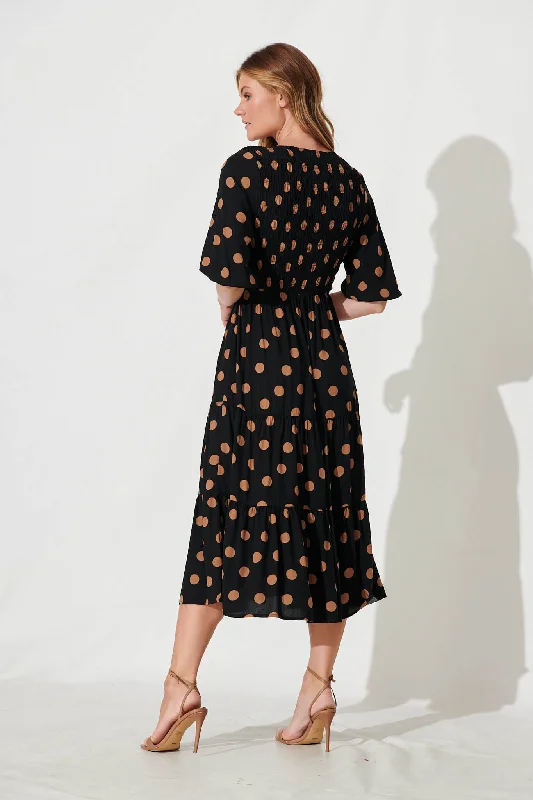 linda-midi-dress-in-black-with-brown-spot