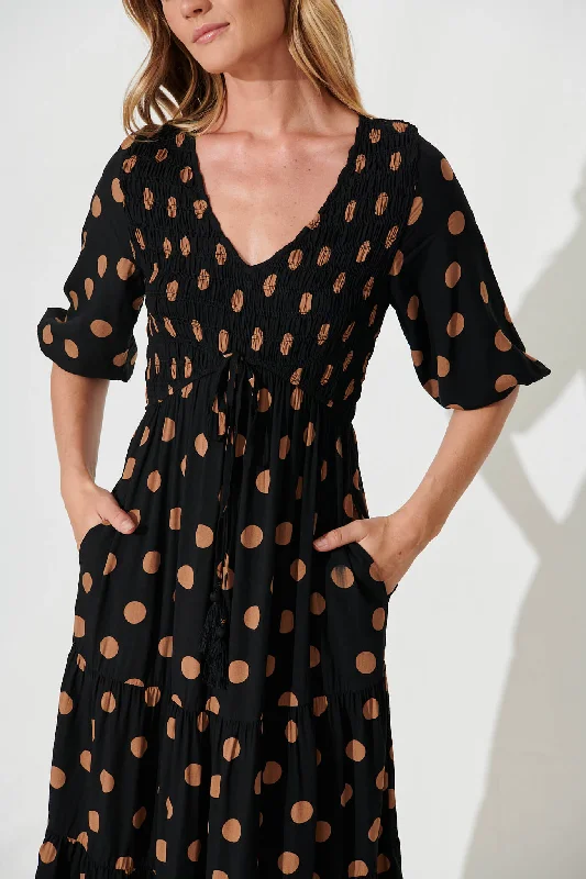 linda-midi-dress-in-black-with-brown-spot