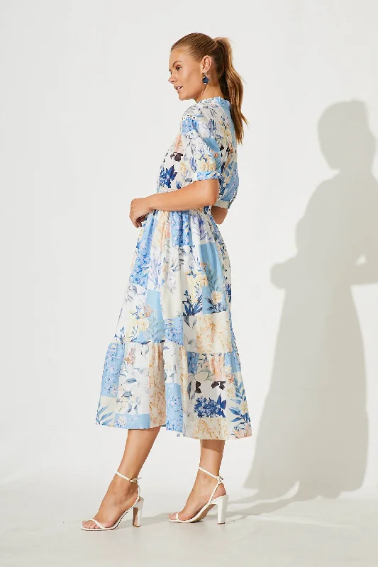 lynette-midi-dress-in-beige-with-blue-patch-floral