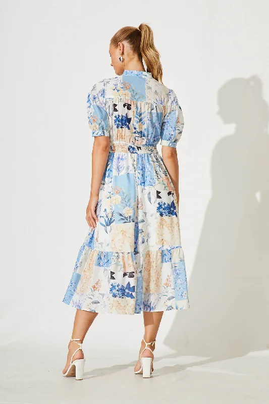 lynette-midi-dress-in-beige-with-blue-patch-floral