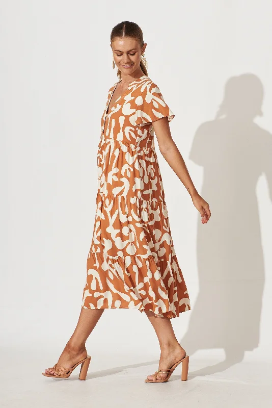 monaco-midi-smock-dress-in-tan-with-cream-print