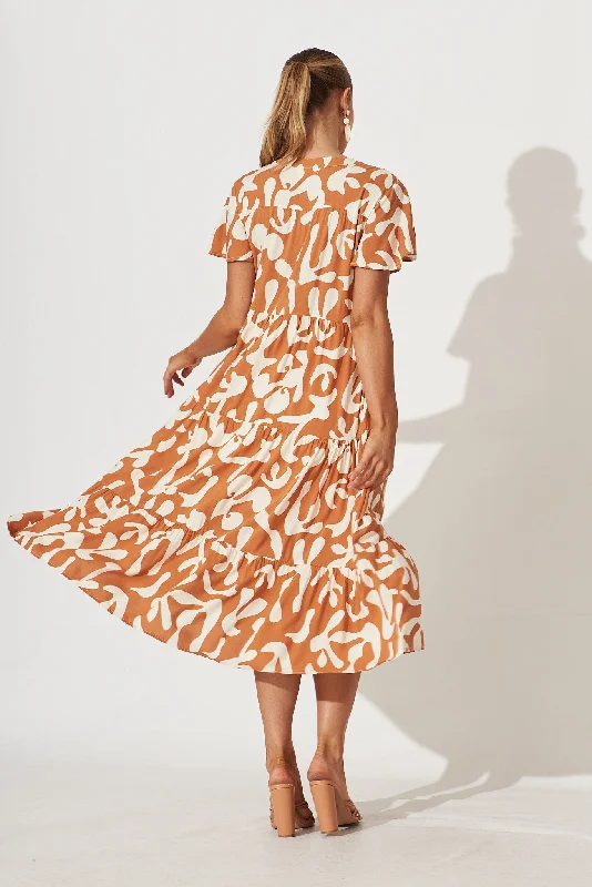 monaco-midi-smock-dress-in-tan-with-cream-print