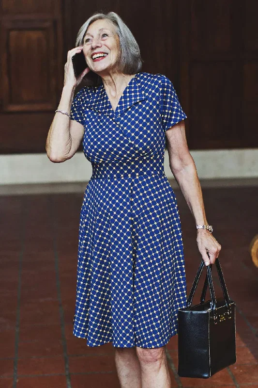 peggy-dress-navy-and-gold-cross-dots